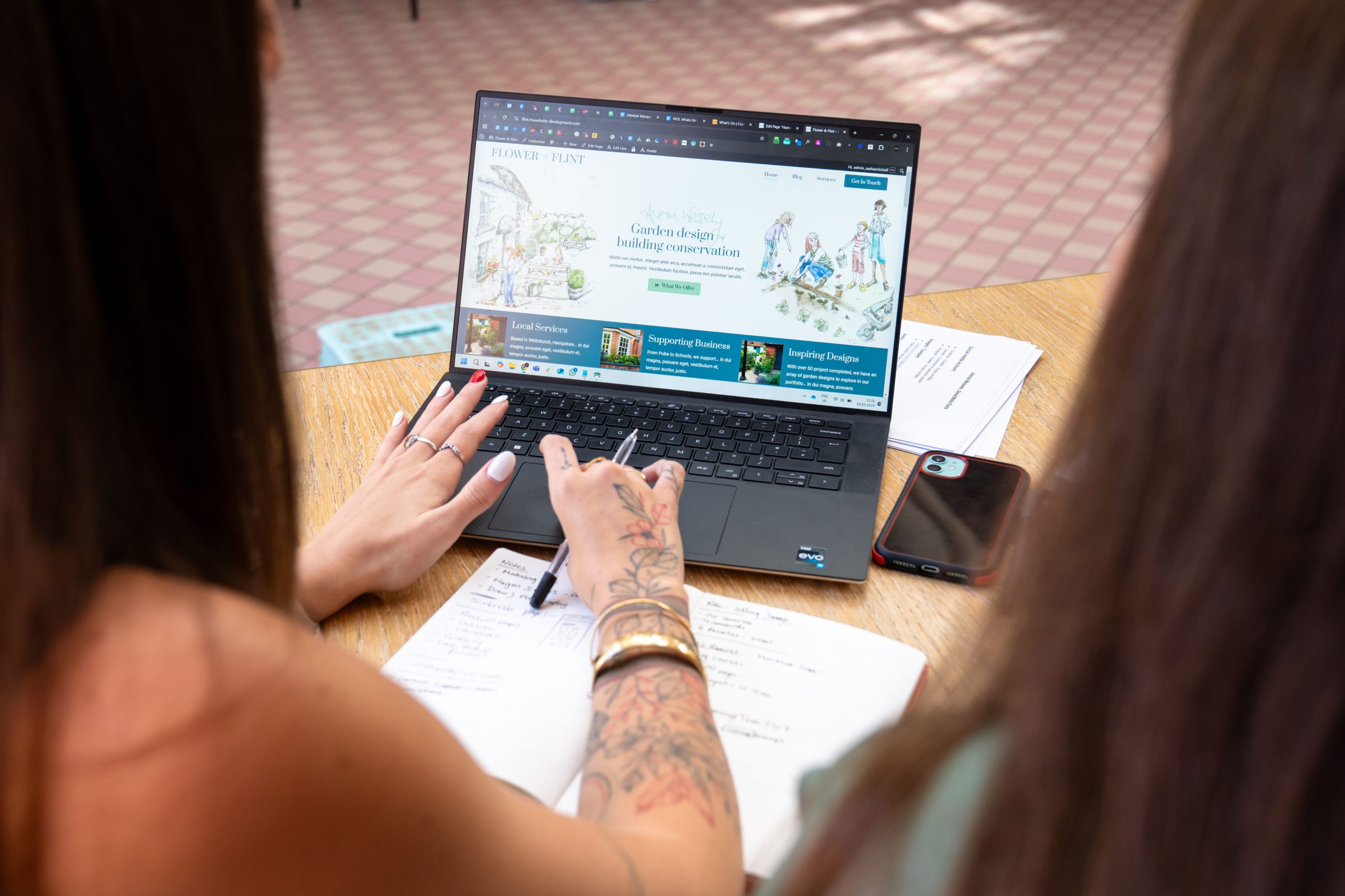 Sasha Mitchell Chell Web & Design laptop working website design graphics maintenance SEO agency bespoke web working build template bespoke site wordpress