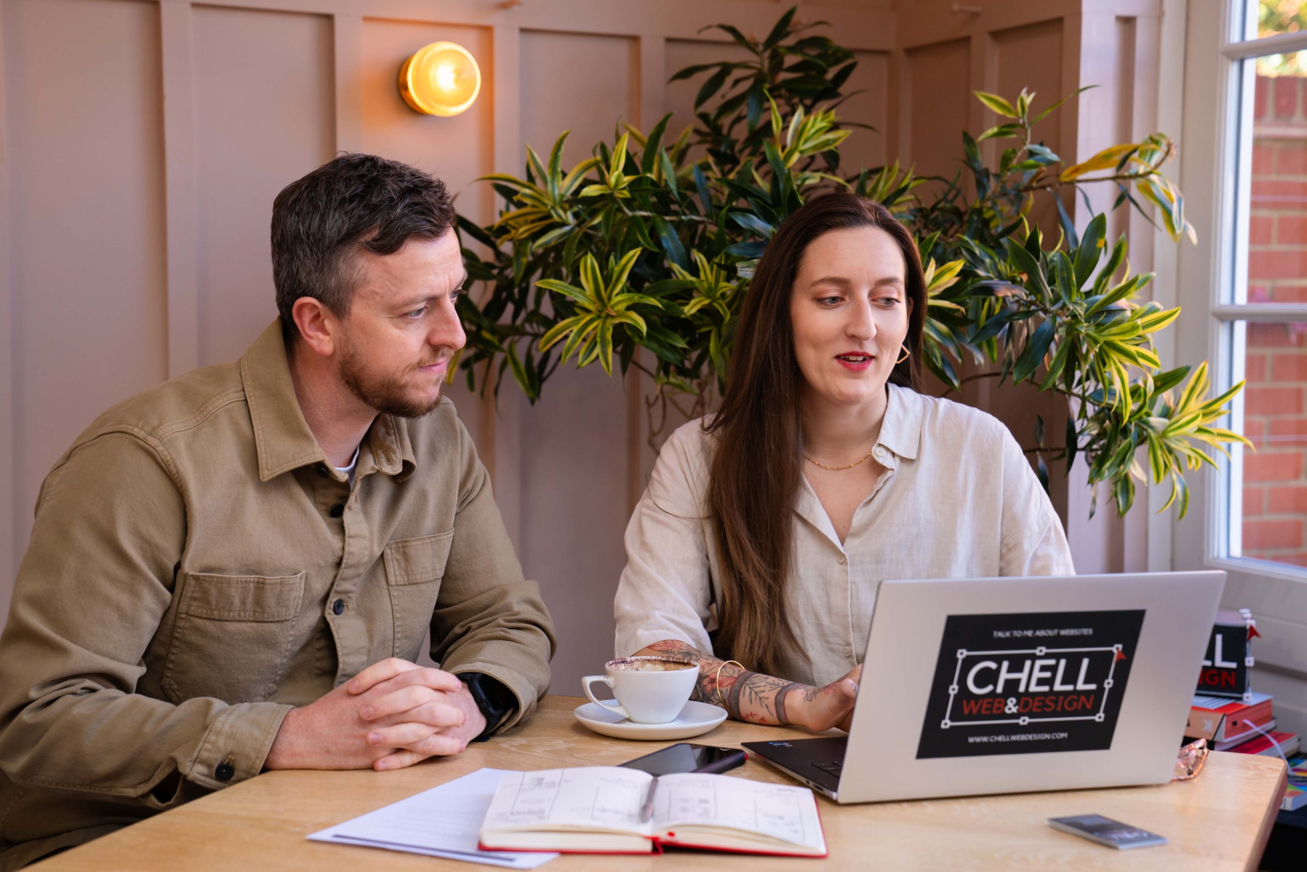 Sasha Mitchell Chell Web & Design laptop working website design graphics maintenance SEO agency bespoke web discovery call meeting brainstorming team