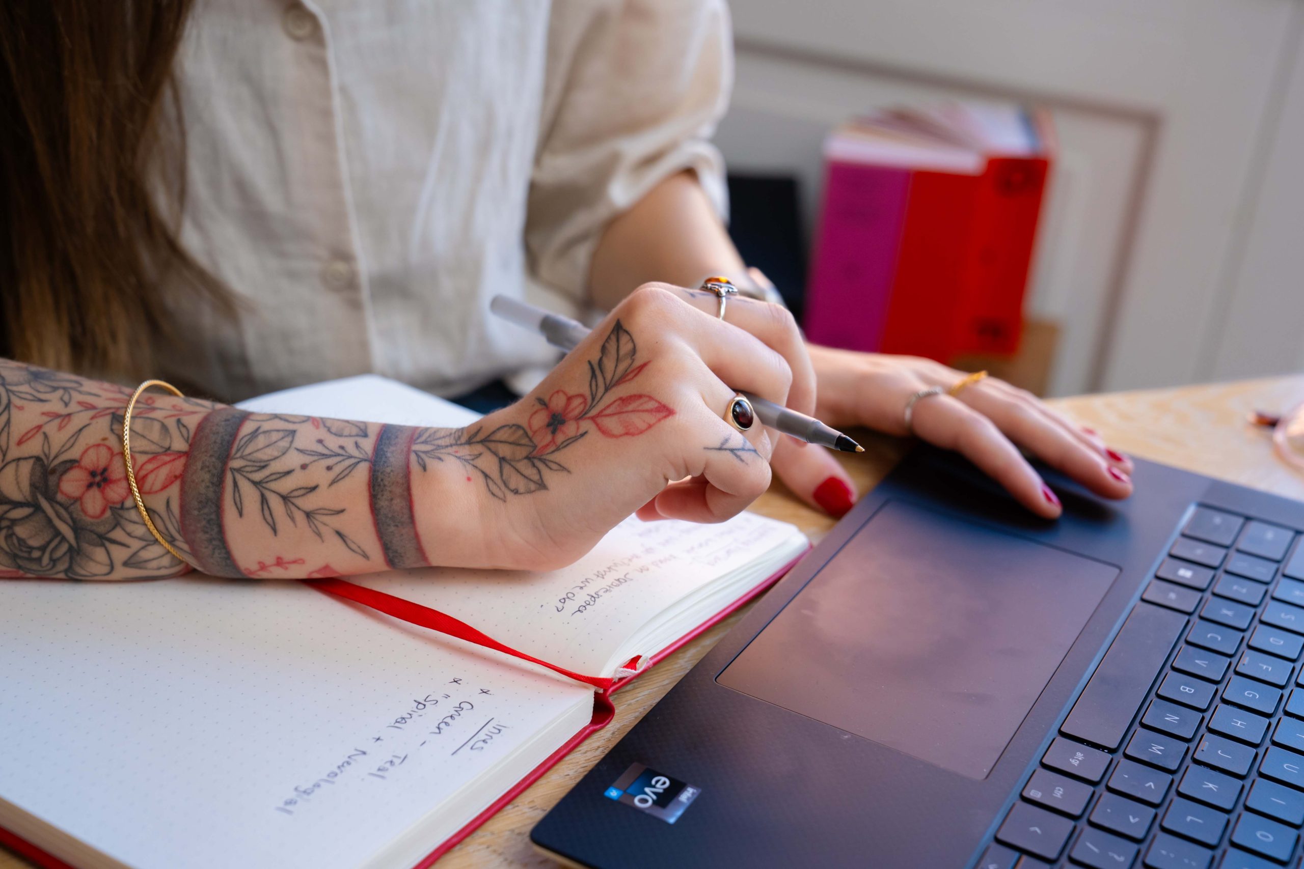 Sasha Mitchell Chell Web & Design laptop working website design graphics maintenance SEO agency bespoke web discovery call meeting brainstorming team