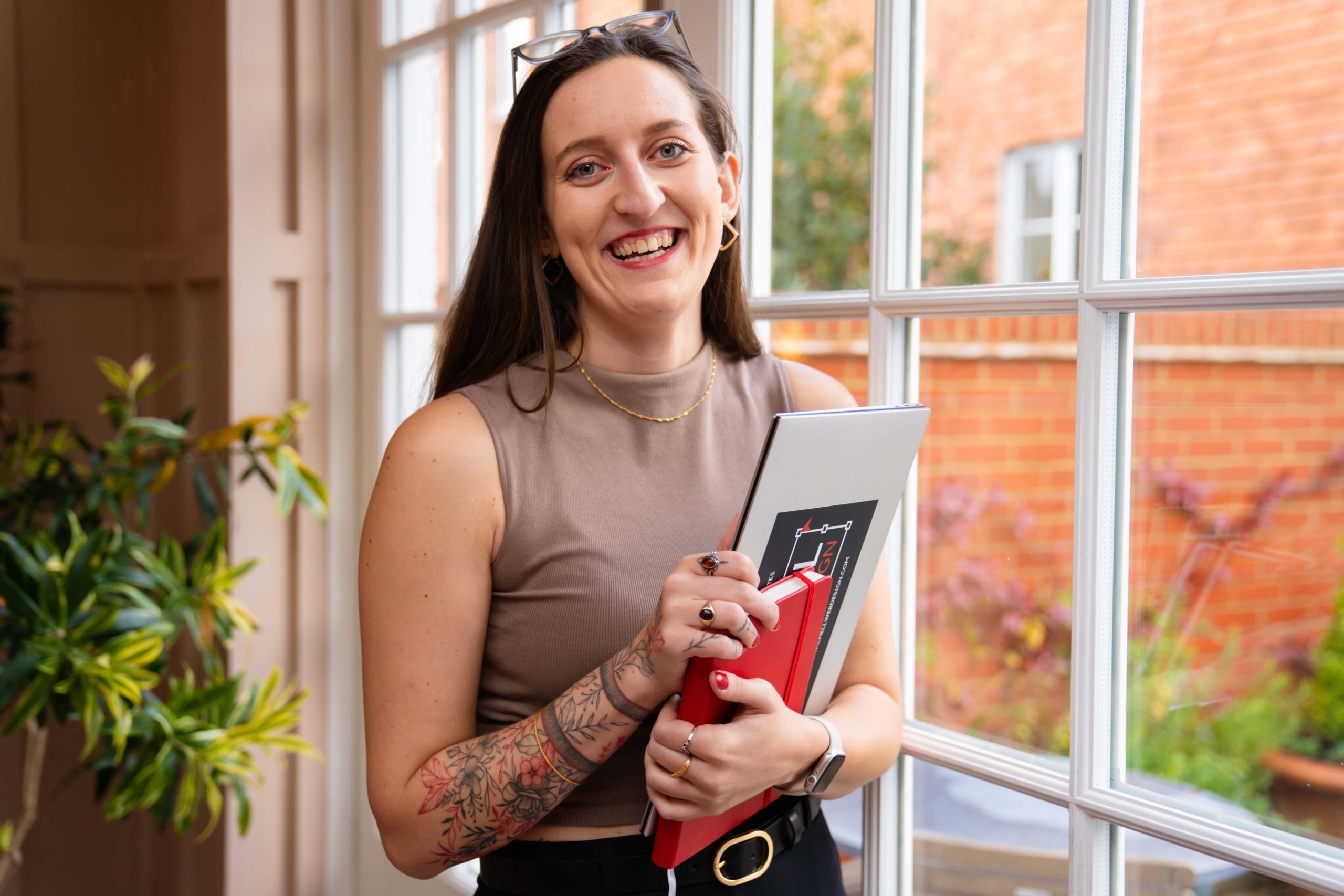 Sasha Mitchell Chell Web & Design laptop working website design graphics maintenance SEO agency bespoke web Headshot